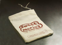 Cotton logo bag filled with 1 pound of green coffee