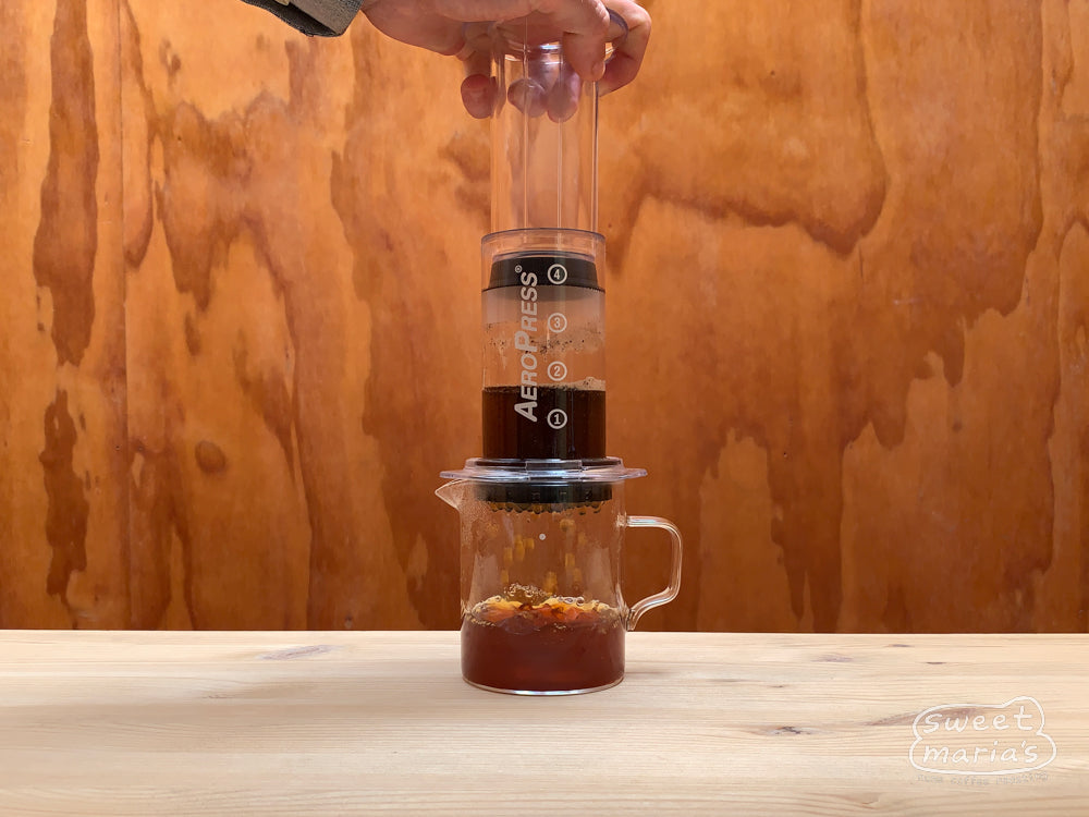 AeroPress Clear actively brewing 