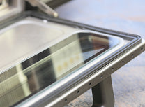 Interior of the Behmor 2000AB front door with viewing window. 