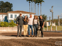 The Wagner family pose for a photo on their drying patio at Sao Jose farm.