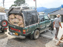 Toyota Hilux suspension being put to the test by a full load of coffee being delivered to the Buesaco association.
