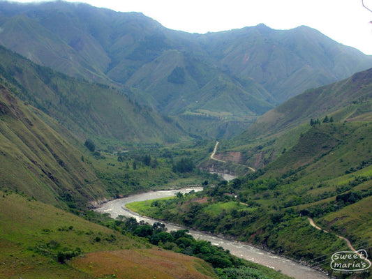 The winding Río Páez cuts its way through the coffee lands of Inzá, a source of fresh water for many small coffee farming communities. Cauca, Colombia.