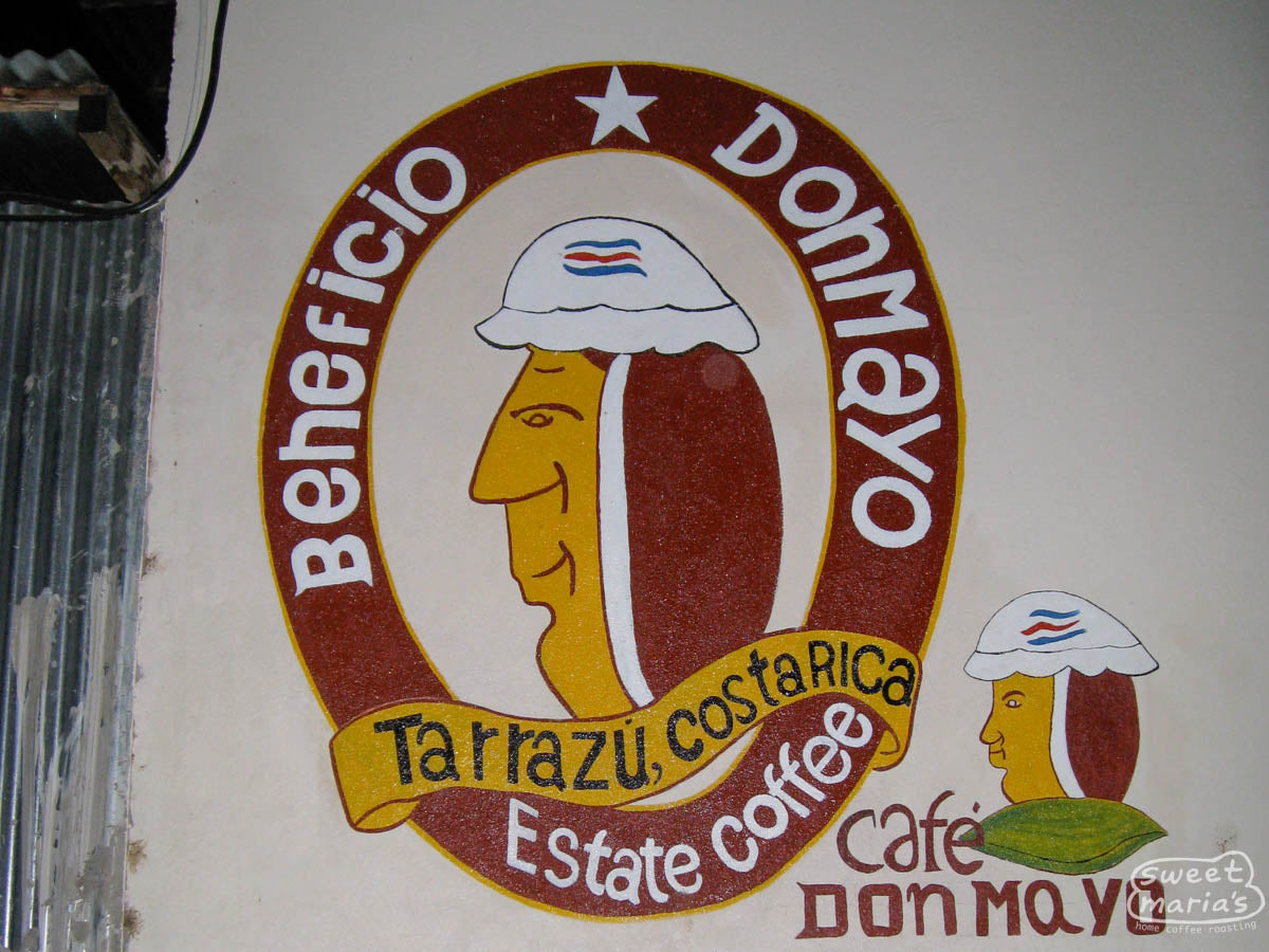 Beneficio Don Mayo sign painted on the side of the office building next to the drying patio.