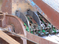  culling defects by hand as they go. Banko Gotiti wet mill