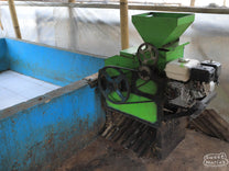 Small coffee pulper run by gasoline engine at a processing site in Bajawa area of Flores.