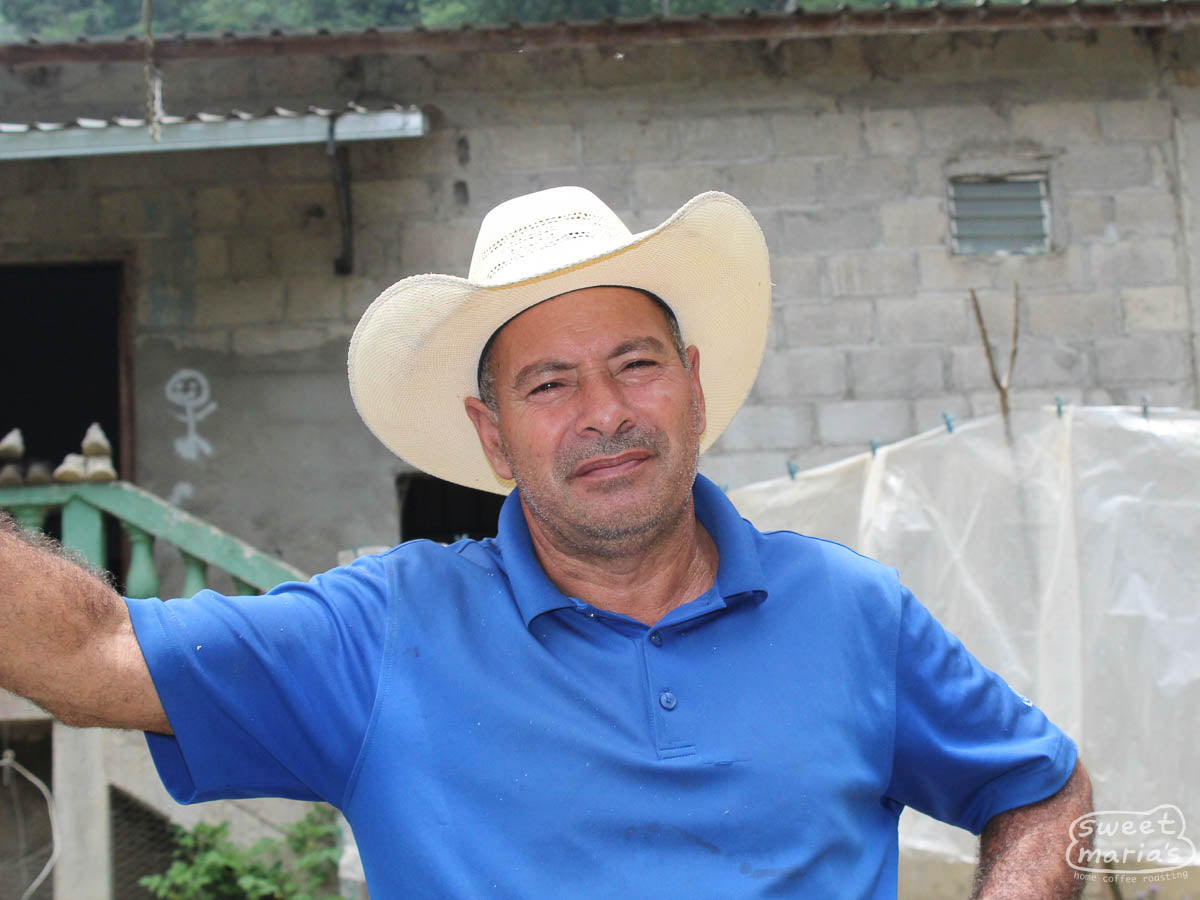 Wilmer Dubon poses for a photo at his coffee farm, El Bordo, in El Cedral, Honduras.