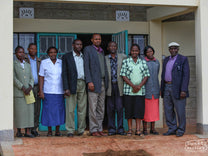 This is a photo from 2009 of several cooperative workers at Gikanda Farmers Cooperative Society, of which Gichathaini is a part of.
