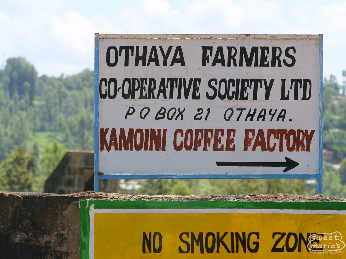 The had painted sign as you enter the Kamoini green coffee factory in near Othaya town in Nyeri, Kenya.