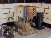  it is not so lightweight that it slides around the counter when putting in the coffee handle