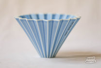 The Origami Ceramic Coffee Dripper, Size Medium, can use Hario V60 or Kalita Wave type filters