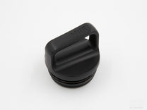 Closeup of the Miir d-ring lid.