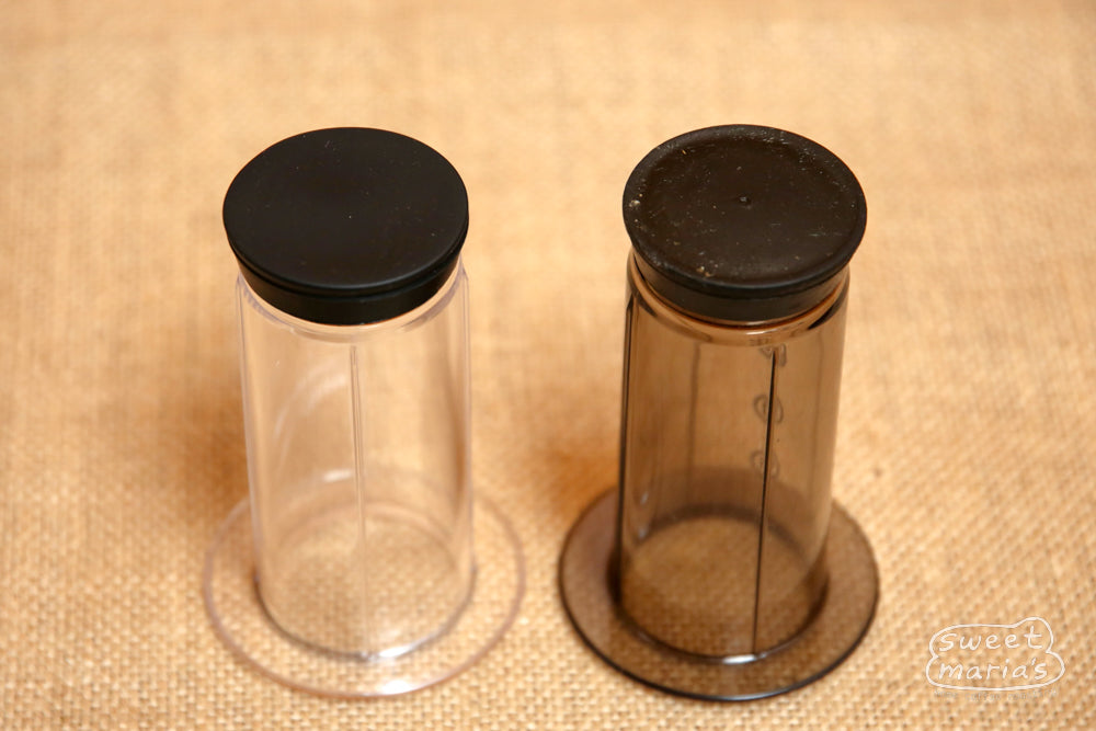Silicone Replacement Plunger End for AeroPress Next to a Worn Out Plunger End