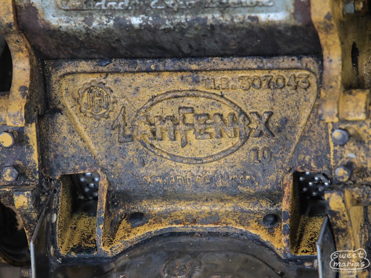 A close-up photo of a coffee pulper at a small Peruvian farm.
