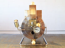 Front view of the Quest M3s with a weighted drop door, analog thermometer and small trier. 
