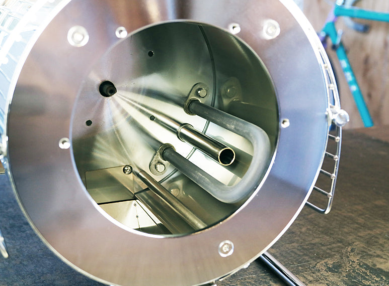 Detailed front view of the metal roasting drum from the Quest M3s
