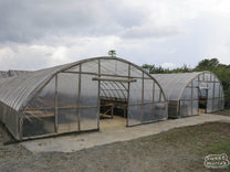 Domed, parabolic, drying rooms for green coffee (often called "solar dryers") at Asman Arianto's Ribang Gayo site in Aceh Tengah, Sumatra.