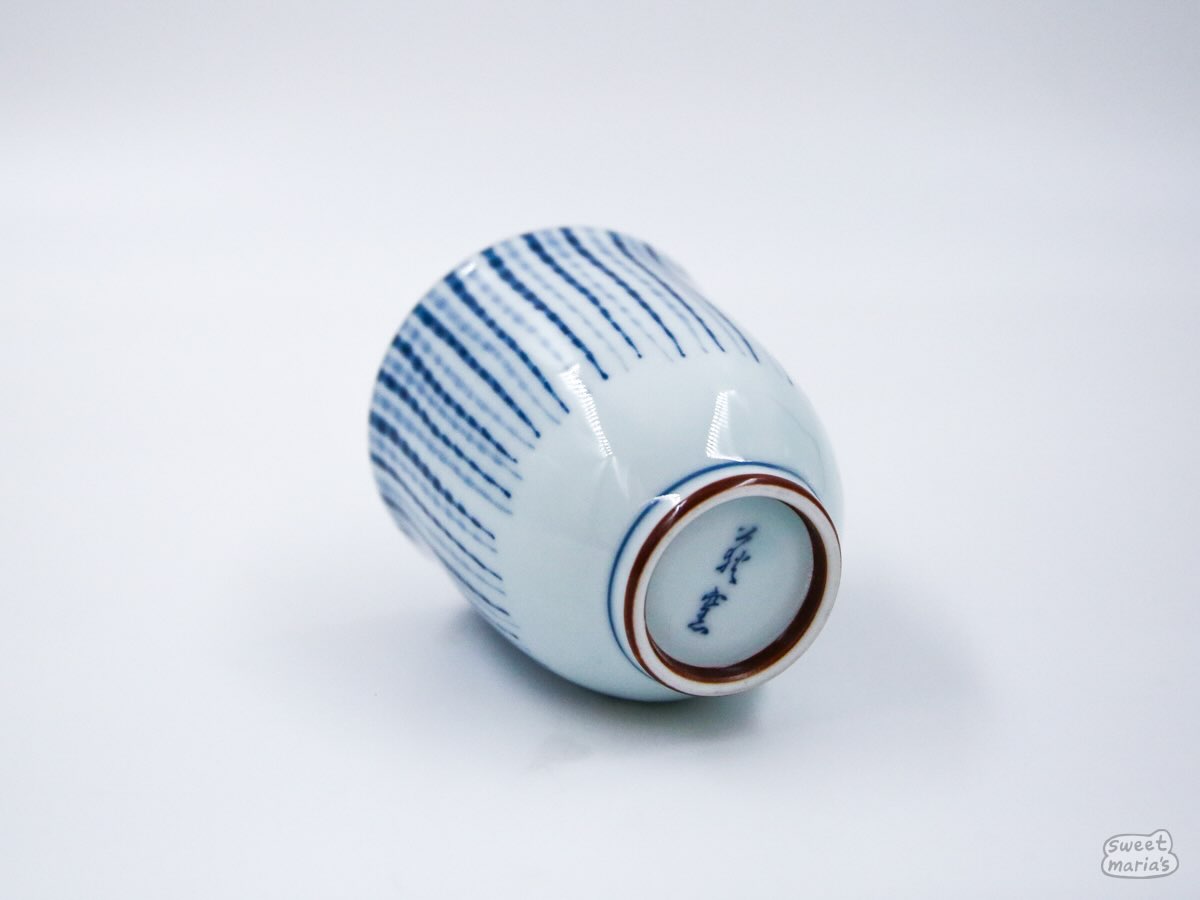 The Blue Tokusa Cup features a striped Tokusa pattern with bronze accents.