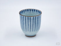 The Blue Tokusa Cup features a striped Tokusa pattern with bronze accents.