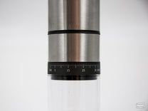The size of the Cordless Electric Grinder with SS Burrs in comparison to our Sweet Maria's Dots Diner Mug.