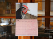 This year's calendar now has a hole punch on all pages so you can easily hang it wherever you want.
