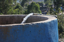 Fresh water source fills the reservoir used for processing coffee at a site run by the same family who own Buku Abel.