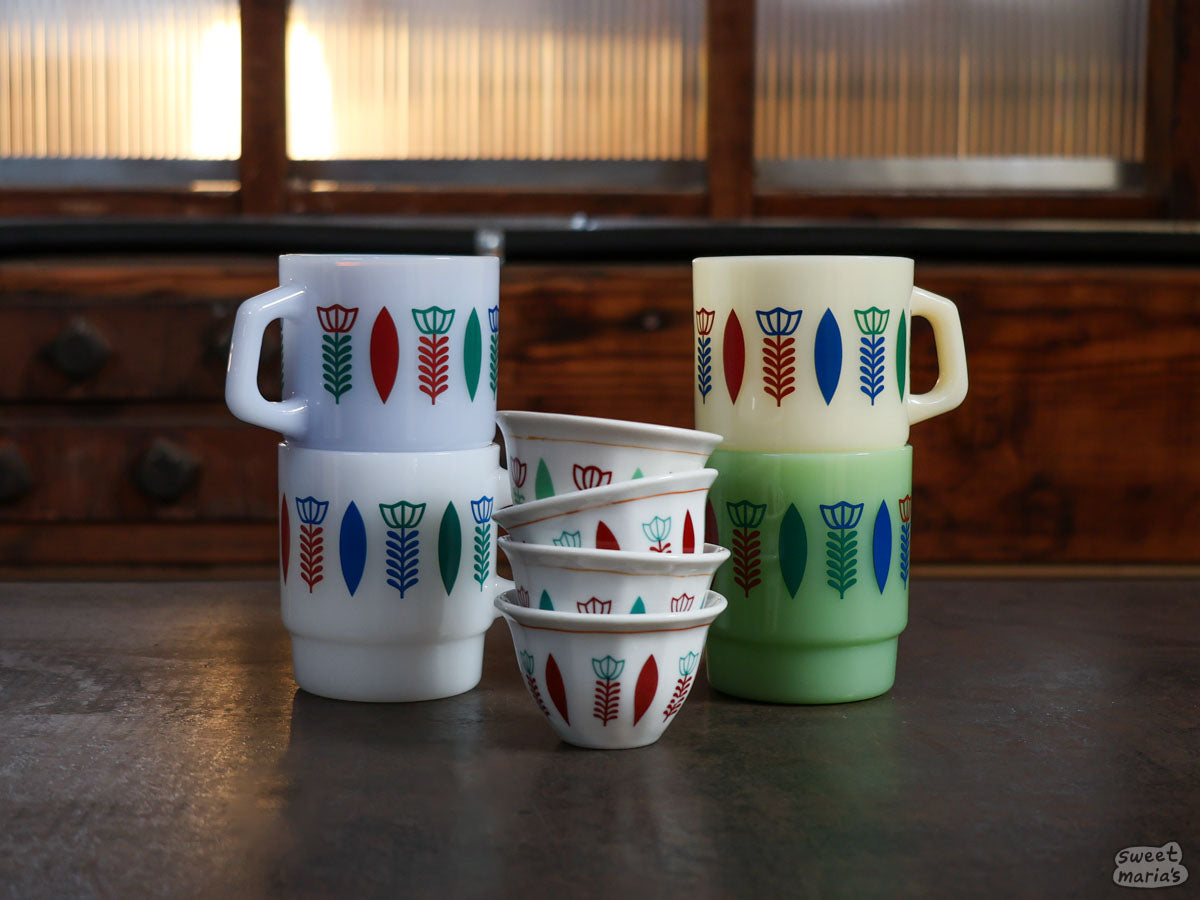 The Ethiopia Sini Glass Mugs feature a wraparound design inspired by the smaller coffee cups used traditionally in Ethiopia.