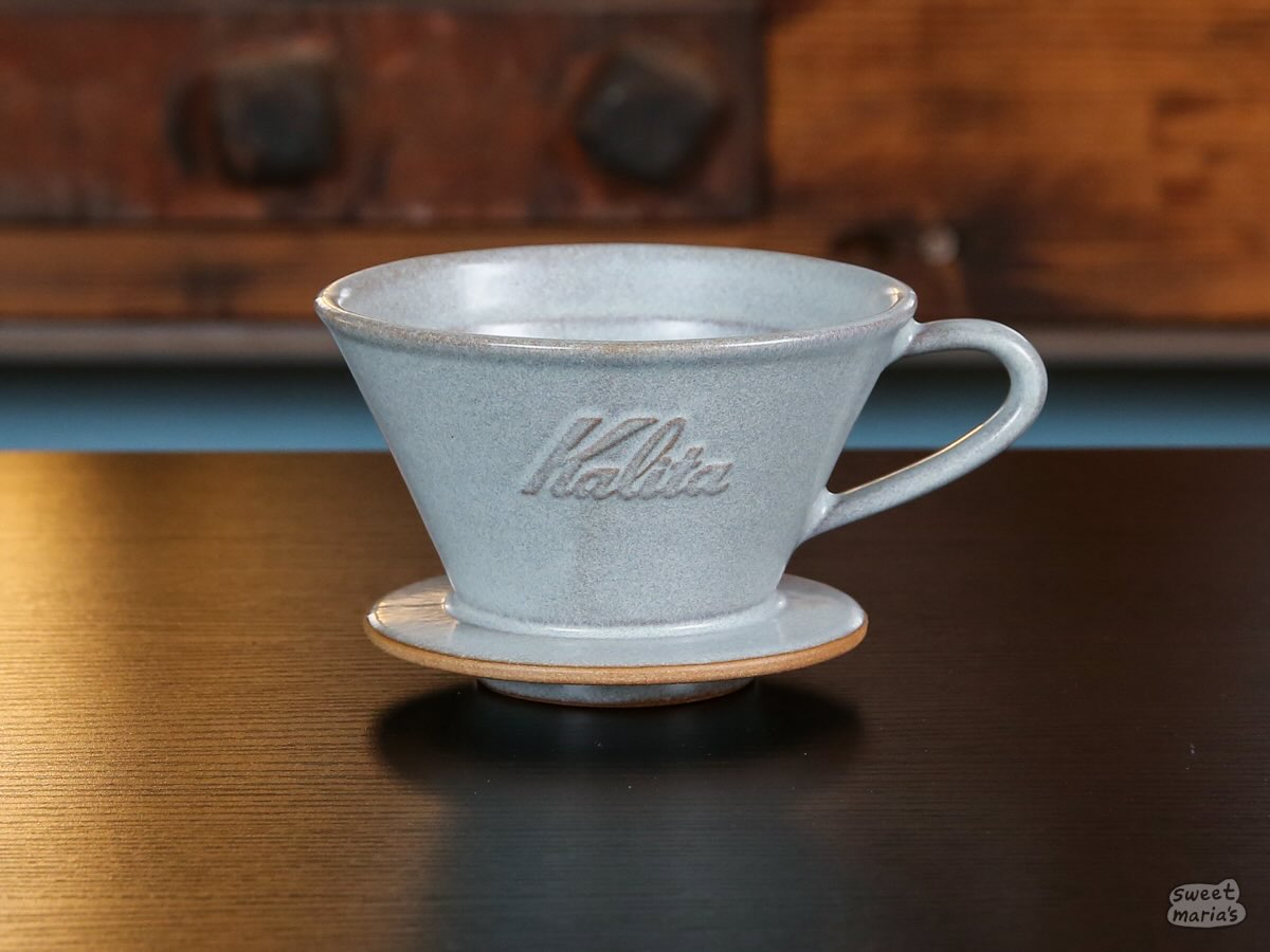 The Kalita MINO Ceramic Dripper comes in a cool, bluish "Sand Gray" colorway.