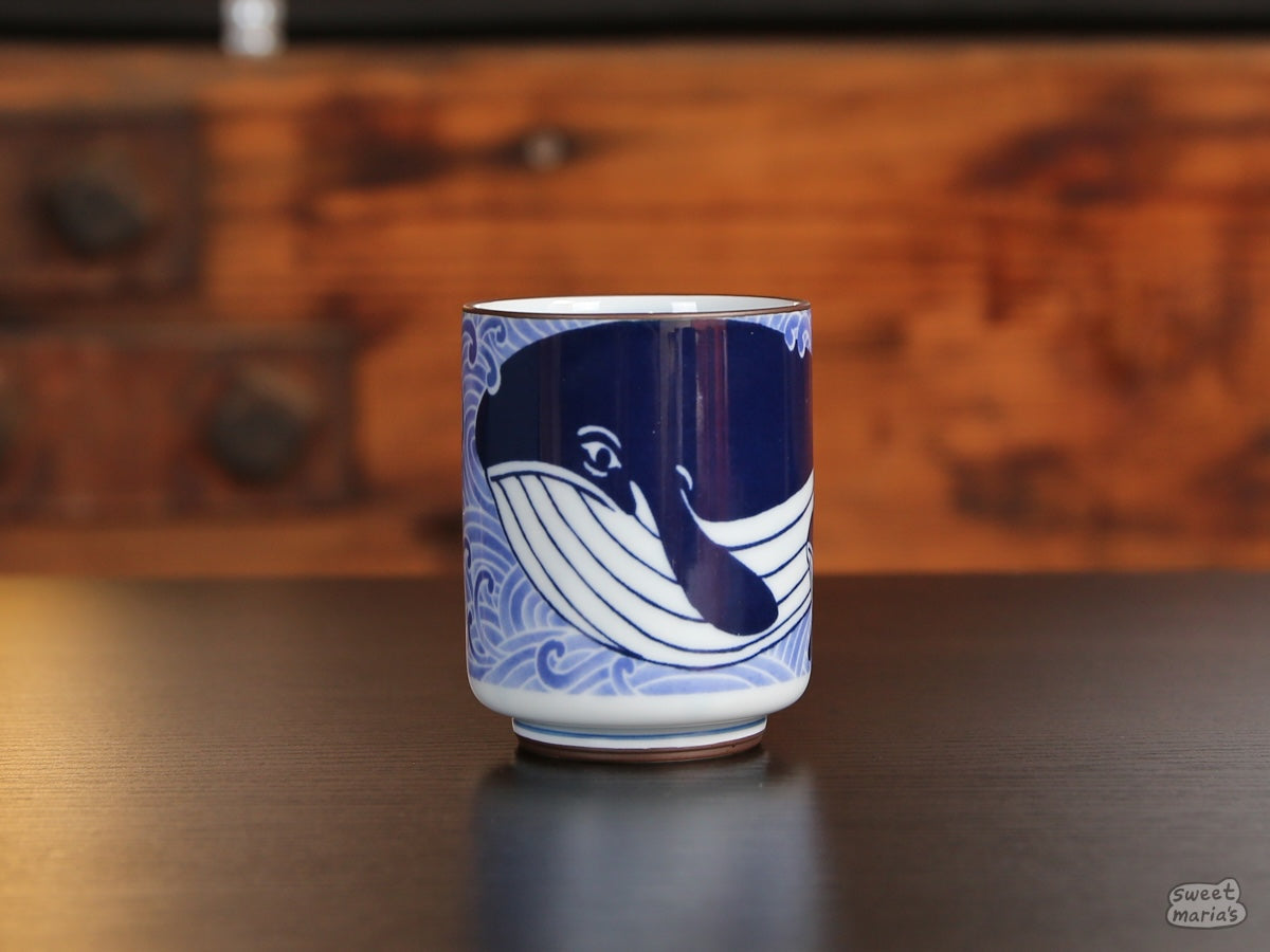 The Sad Whale Ceramic Cup holds about 8 oz of liquid.