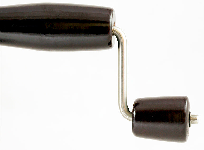 A crank handle controls the drive shaft