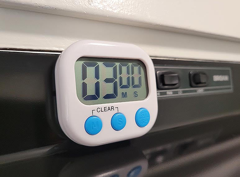 white timer with magnet and stand