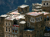 Coffee dries on the rooftops to create a colorful patchwork atop an already incredible stone city backdrop.
